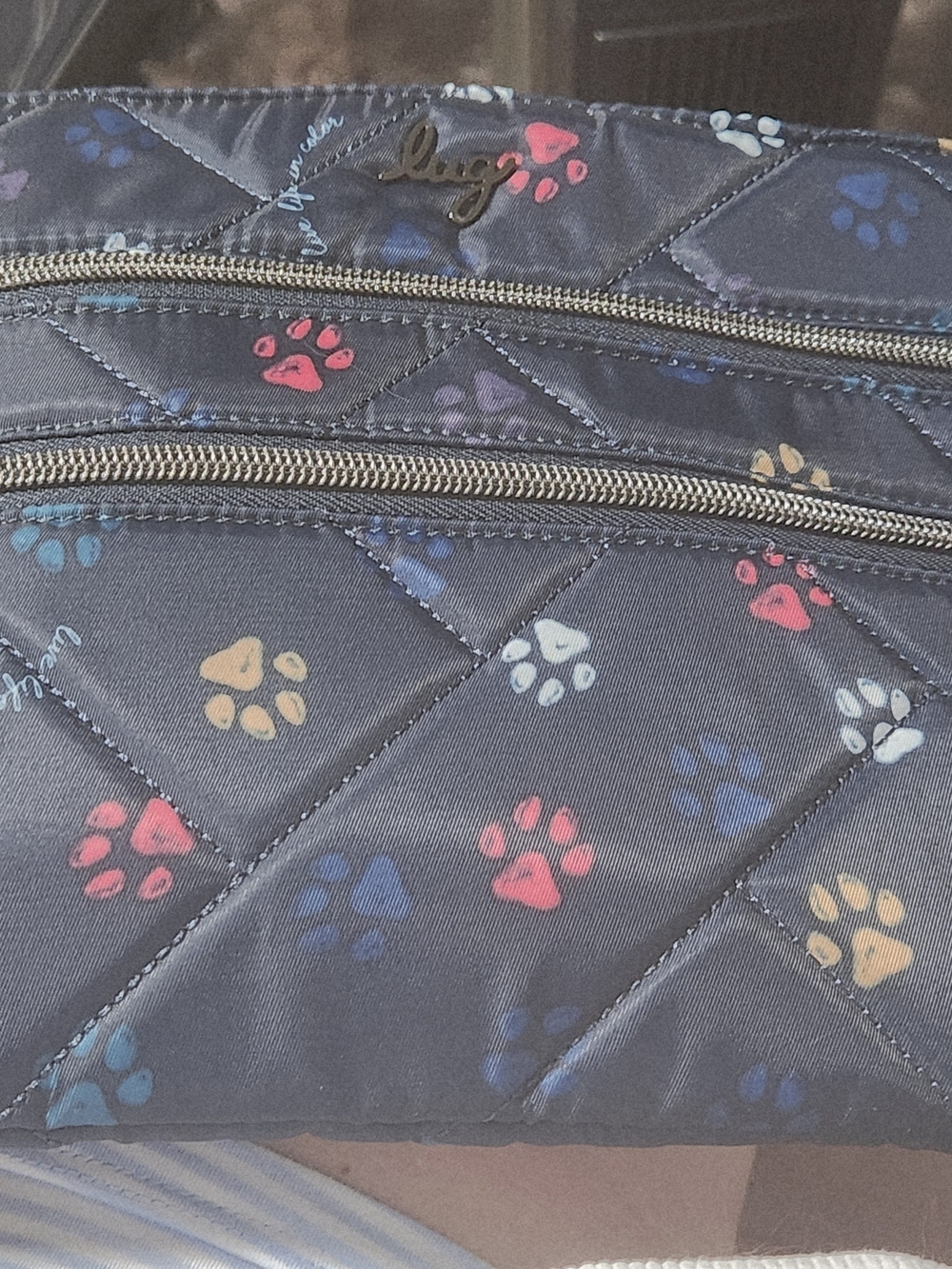 lug Quilted Navy Crossbody Bag with Multicolor Paw Print Accents